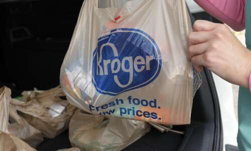 A federal judge temporarily halts the proposed supermarket merger of Kroger and Albertsons